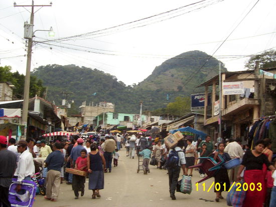 ...pedestrians share this street with occasional cars and trucks...