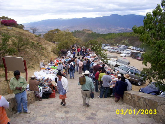 ...or passing a gauntlet of vendors and stalls that tourists must pass...