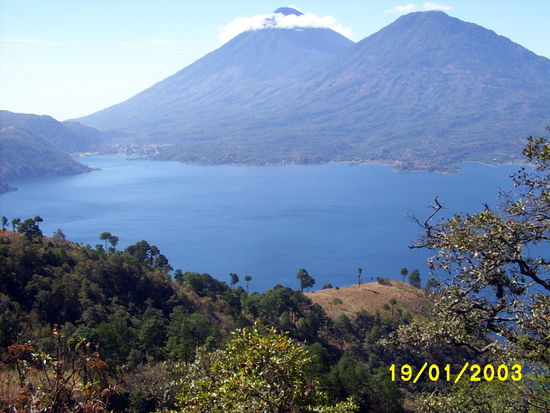 ...lake Atitlan with villages nested under an active volcano...