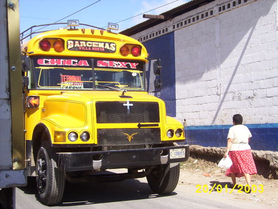 ..."Chica Sexy" bus driver also put the cross up front for the faithful...