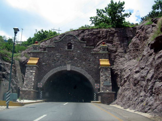 ...old mining tunnel converted into a road tunnel. The modern entrance is misleading...