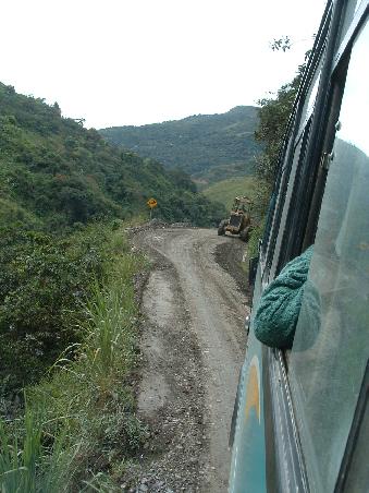 I do not mention the end of the rainy season, the waterfalls, the porous and sliding road, the overloaded bus balancing from west to east, the people sleeping on the ground between our feet, the smell of non-fresh meat to be sold on the market on the next day. There was a silence in the bus (locals were sleeping, tourists tried to do so to avoid thinking about the abyss).