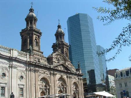The cathedral on the Plaza de las Armas, the most animated place of Santiago. Here the typical contrast of olb building and sky-scraper.