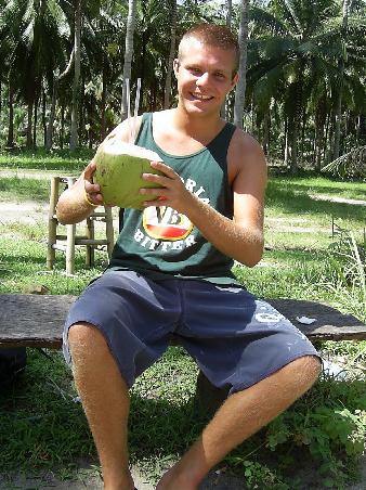 Drinking straight from a Coconut