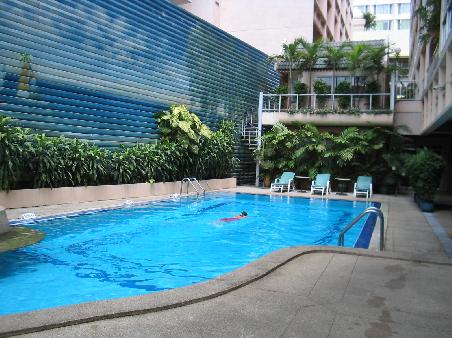 Jess in pool at Suriwongse Hotel