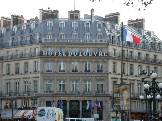 Our room is the door above the open door on the top floor to the right above the sign.