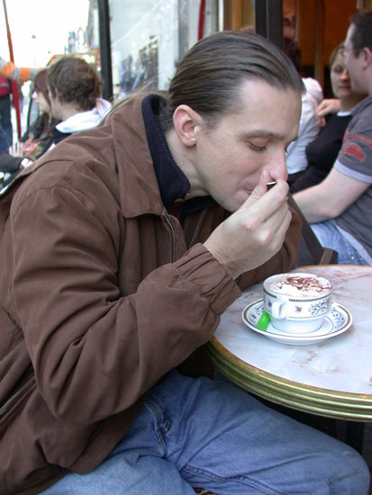 Andy tries not to fall into his cafe creme.