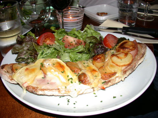 My dinner was a "tart" made of french bread with ham, potatos, mushrooms, and strong french cheese.  It was so yummy.