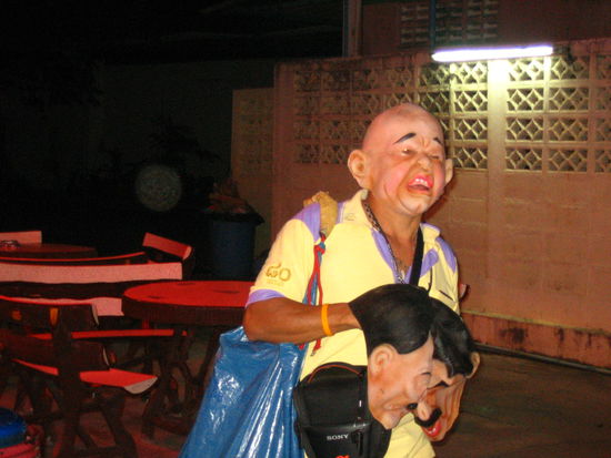 A creepy guy selling masks