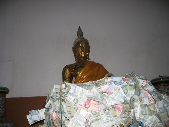 This buddha is covered in baht