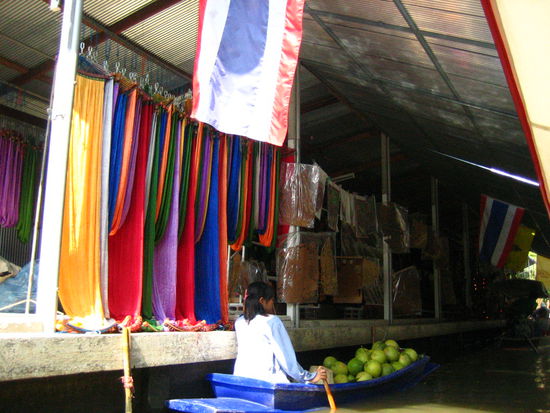 I love the contrast of the Thai rower against the silks