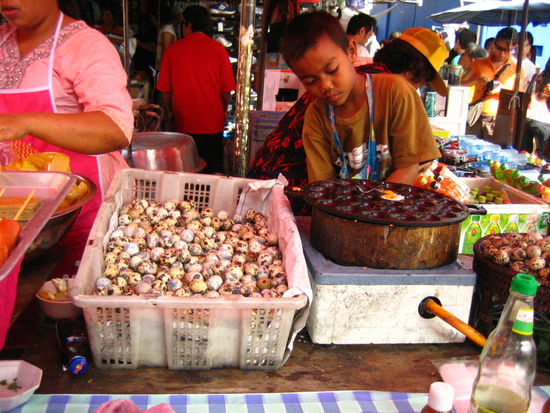 This kid fries up some quail eggs