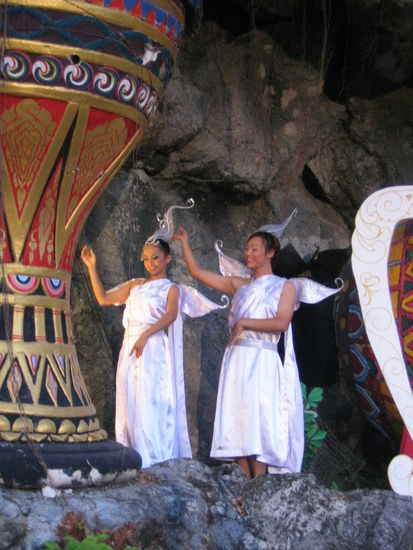 A very bad impression of Milli Vanilli, with a failed attempt to lip sync to Christmas carols