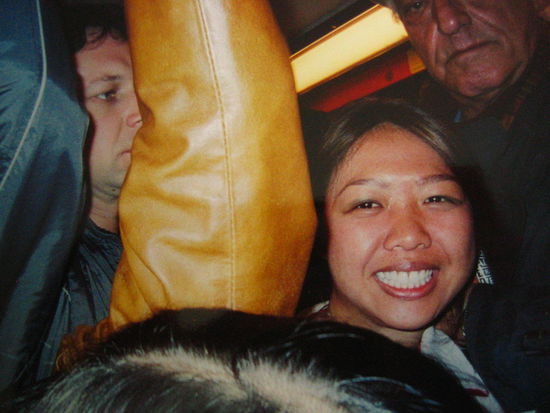 Squished between all these smelly people