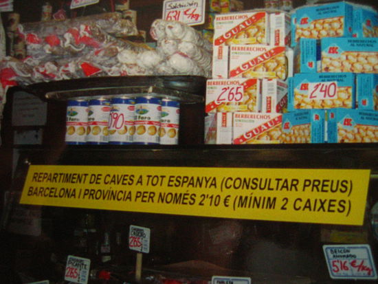 The Champagneria-- with its dried meats, breads and hanging racks of ham