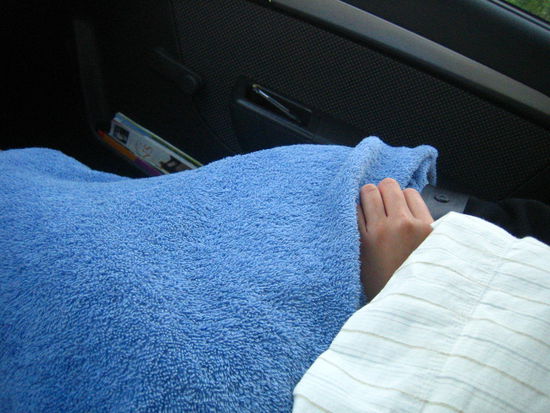 Using a towel as a blanket... talk about ghetto-fabulousness