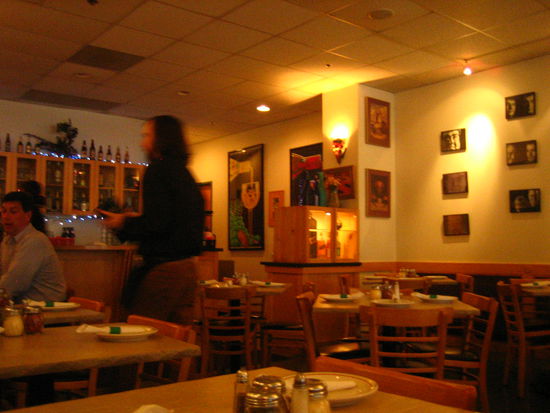 Our waiter--in a rush to get our food order in.