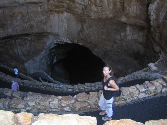 Jen is almost near the mouth of the entrance