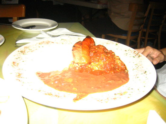 Jen orders the etoufee, jambalaya and red beans trio