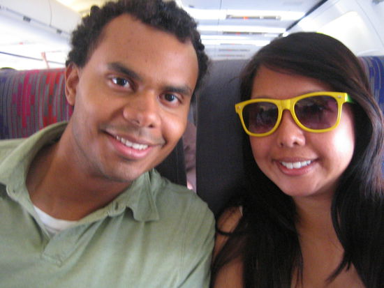 Adam and I finally board the plane! (The neon glasses were so IN during this time)