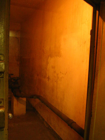 Small narrow rooms with pipes running through