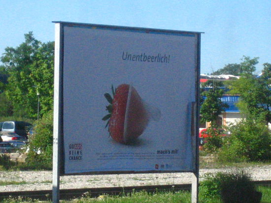 I don't get this ad...does it mean that this is a 'magnum' sized condom, great on circumference? Does it mean the strawberry has gone through many safe procedures, thereby making it healthy for consumption? I have no idea...