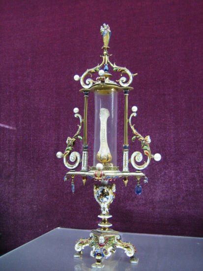 A baby bone encased in finery