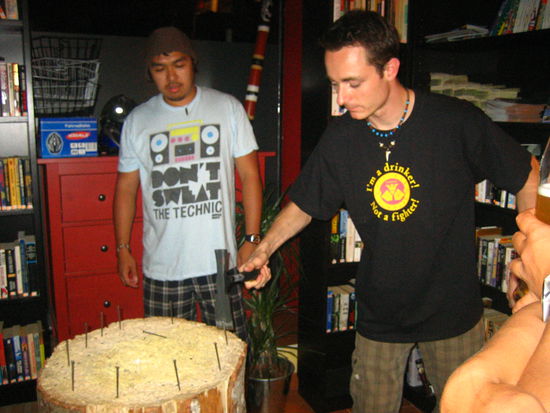 The nail game: To be the first to pound the entire nail into the tree stump in one hit (using only the flat, thin side of the  hammer)