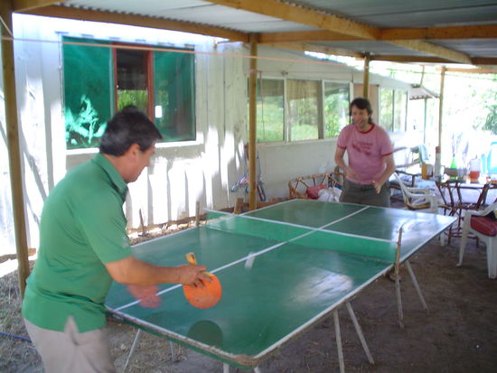 My Tio Memo whipping Julito and ping pong.