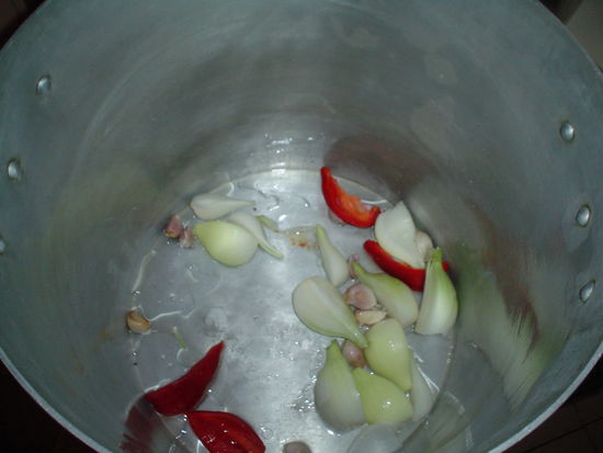 Then you fry some stuff in the bottom of a pan.