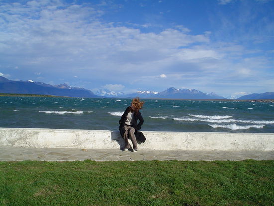 Kelli trying not to be blown into the water.