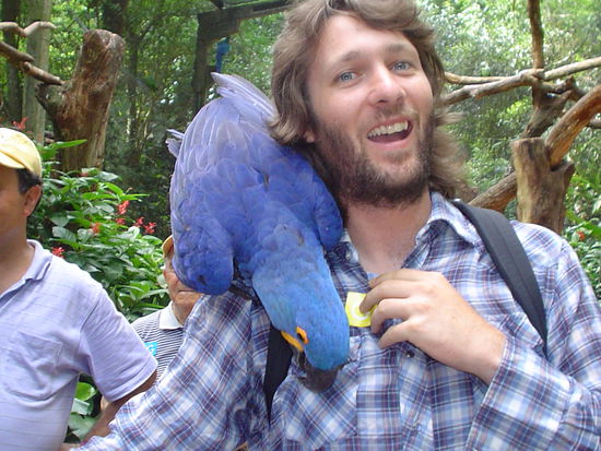 ¨Ummmm. . .  can you get him off me, I think he is trying to eat my button¨