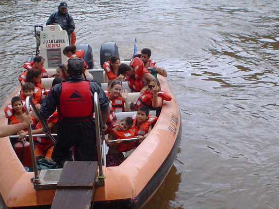 The girls went on a boat ride under the falls that got them very wet.