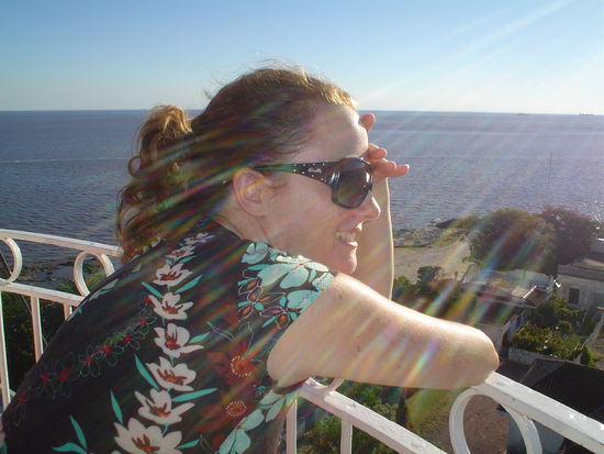 Curly on top of the lighthouse looking whistfully back at Buenos Aires
