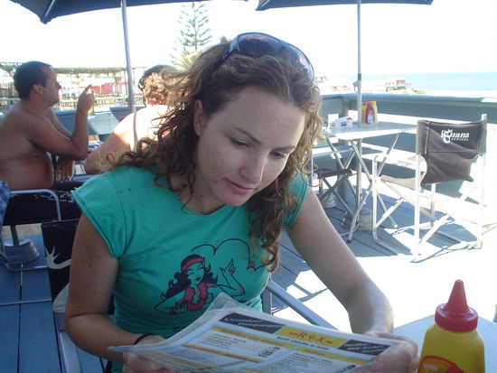 Us eating the ¨best chivito in town¨ at Rex´s.  A chivito is a steak sandwich.  They are very yummy!