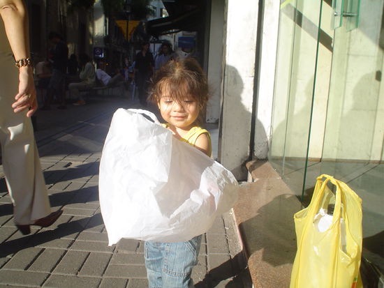 Cute girl playing shop