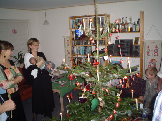 Getting ready to dance and sing around the Christmas tree.