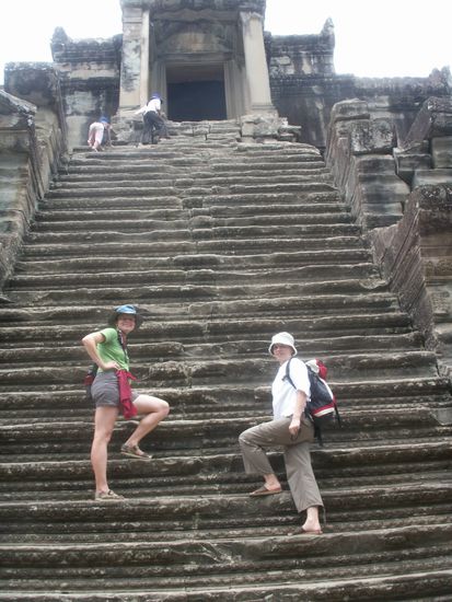 climbing up Angkor Wat