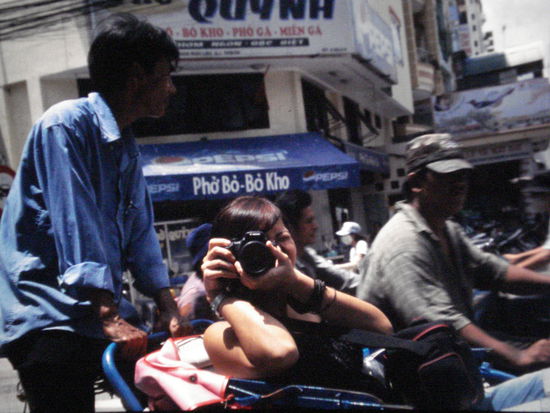 My companion shooting me with a canon mounted on a cyclo!