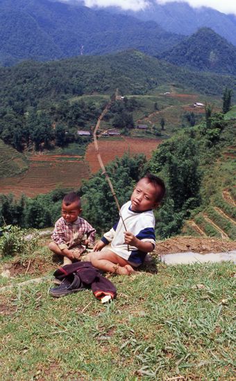 Kids playing in the Village. The background scenery is always nice so I zoom out when I shoot people.