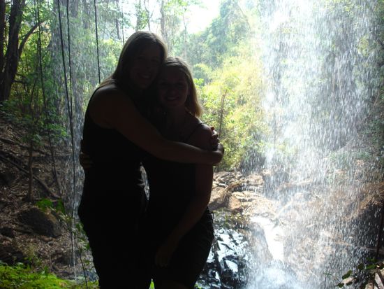 behind the waterfall