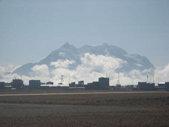 View from the plane when landing in El Alto. Mount Illimani (6400m) is seen in the background.