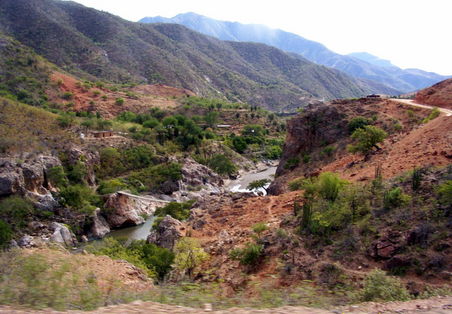 ...people live in the other side of Batopilas river. They cross it on a rickety, swaying foot bridge...