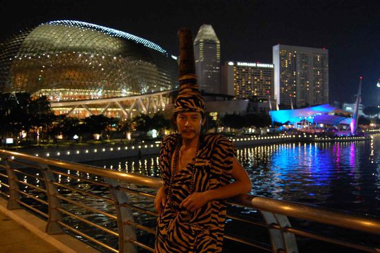 A native inhabitant in his traditional business suit and hair style 