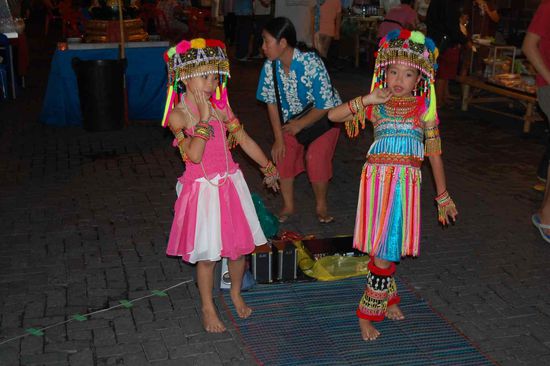 Local folk dance on the night market