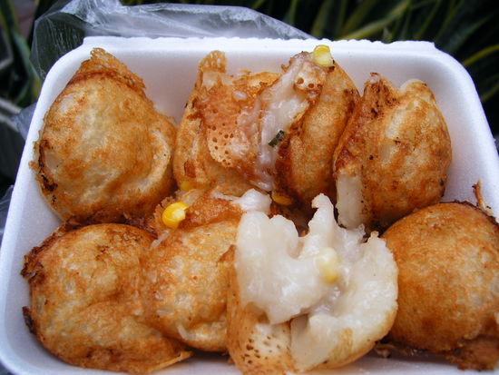 One example of Bangkok's delicious street food: Fried coconut pockets.