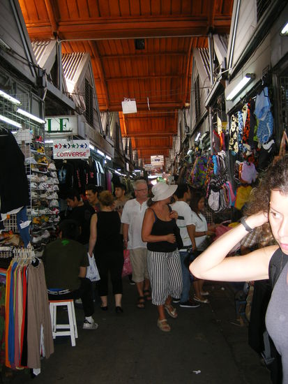 Letisha browses the wares at the Chatuchuk weekend market.