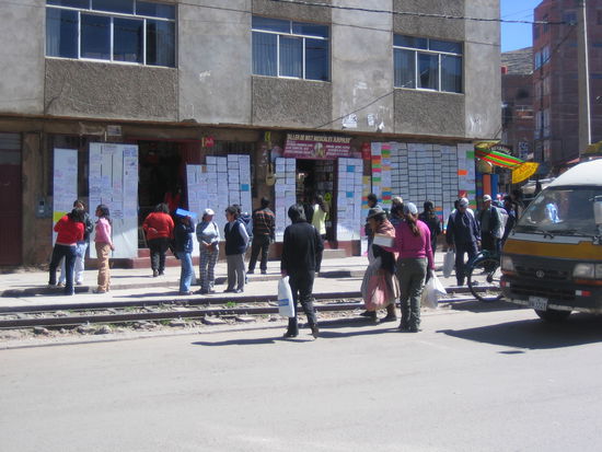 The white papers in the back are job advertisements.