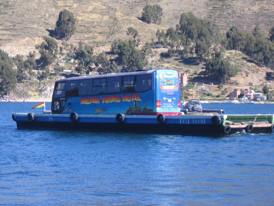 An empty bus on a raft across Lake Titikaka.