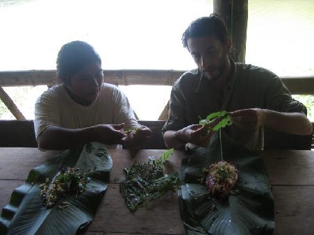 preparing traditional lunch in banana leaves